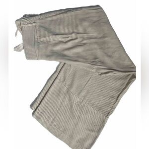 Women’s H&M size 10 pinstriped cream and black cropped, belted‎ pants .